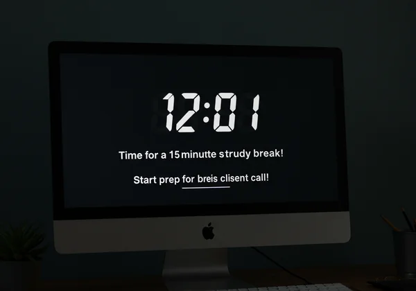 Large, fullscreen digital alarm alert with custom message